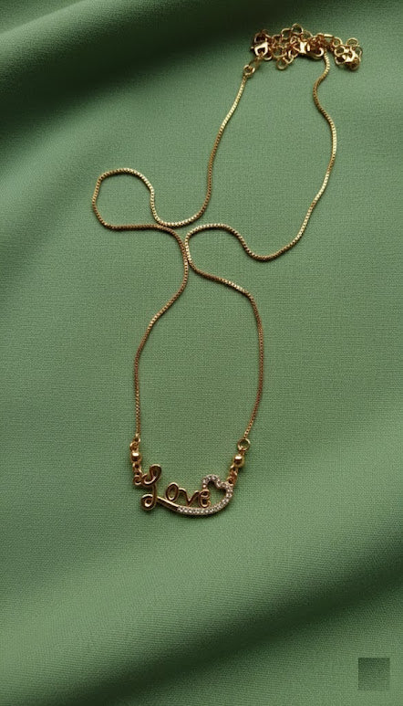Gold-Tone Crystal "Love" Heart Pendant Necklace