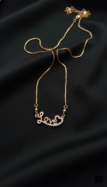 Gold-Tone Crystal "Love" Heart Pendant Necklace